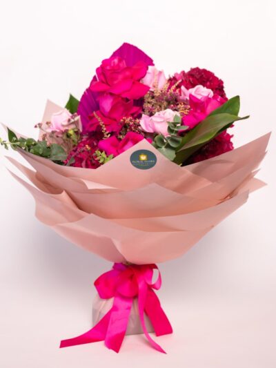 Blooms of Coral – A bouquet of pink blooms filled with roses and hydrangea to remind them they are loved