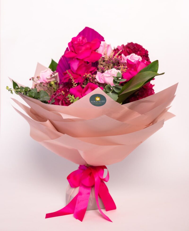Blooms of Coral – A bouquet of pink blooms filled with roses and hydrangea to remind them they are loved