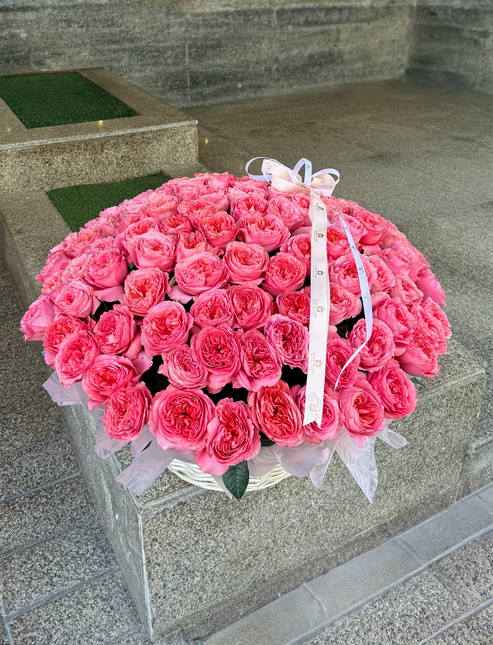 Elegant red roses floral basket arrangement Dubai
